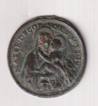 Santa Teresa. Medalla (AE 28 mms.) R/ Virgen del Carmen. Siglo XViii