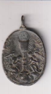 S.M. D. Montserrat. Exergo: Roma. Medalla (AE 35 mms.) R/ Cáliz entre Ángeles. Siglo XVII-XVIII