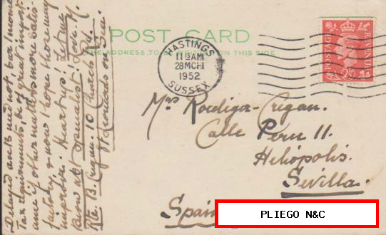 Tarjeta Entero Postal Inglesa. De Hastings a Sevilla. Del 28 Mar. 1952