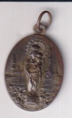 Virgen del Pilar. Medalla (28 mms. con restos de baño de Plata
