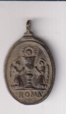 Santa Eucaristía en dos Ángeles. Exergo: ROMA. Medalla (AE 26 mms.) R/ Inmaculada Siglo XVIII